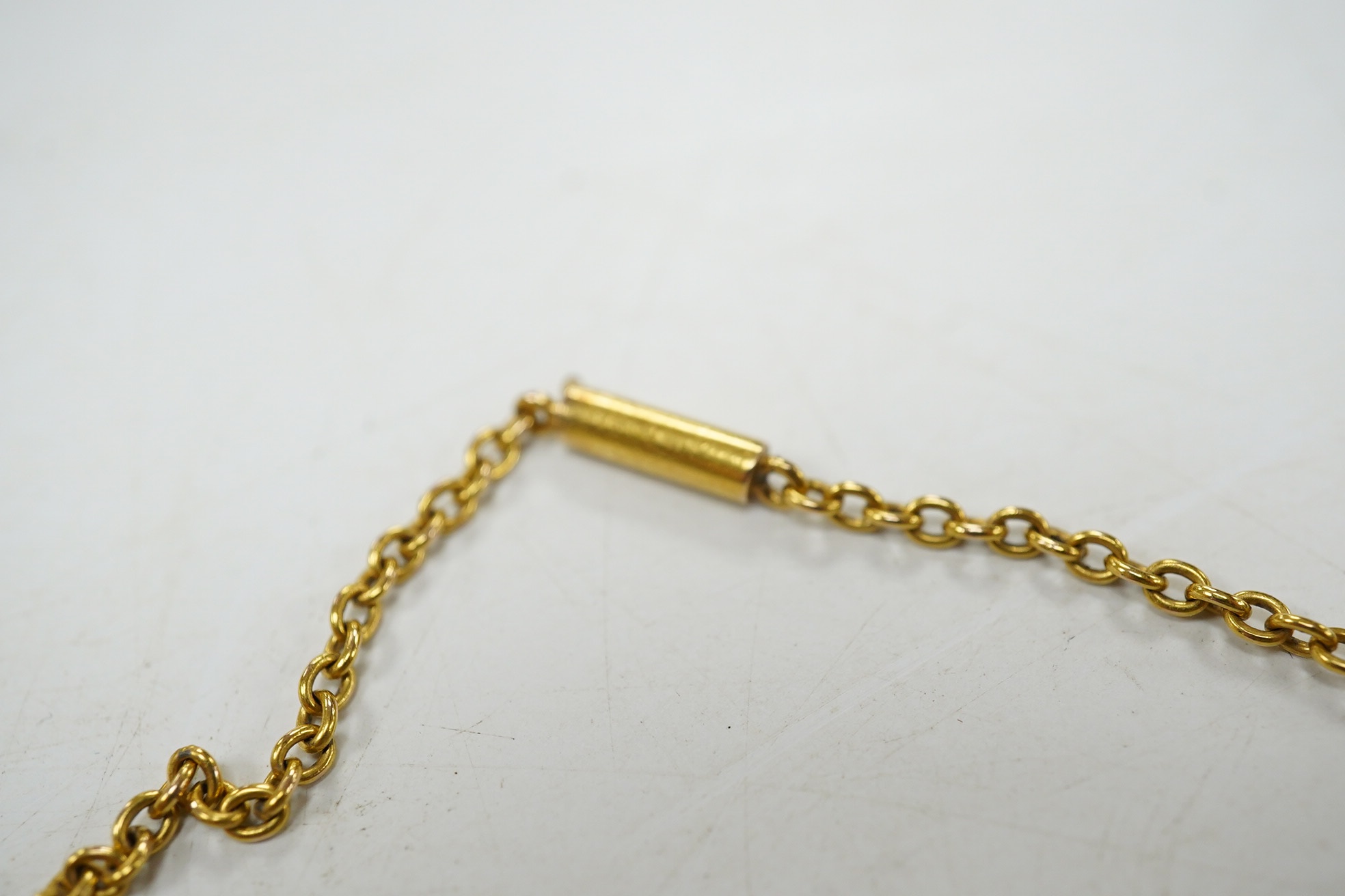 An early 20th century yellow metal and gem cluster set drop pendant necklace, 45cm, gross weight 12.7 grams. Condition - fair to good